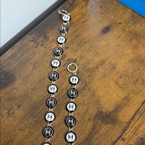 Gold and Black Logo necklace and bracelet set